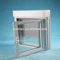 Monoblock sliding window with shutters